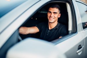 male driver in dealership advertising campaign